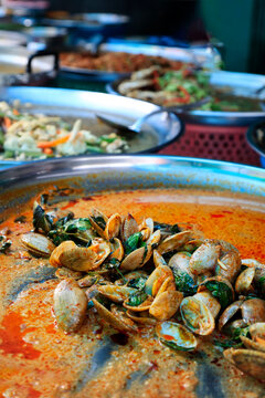 Spicy Stir-Fried Clams in Red Curry Sauce at Thai Street Food Market
