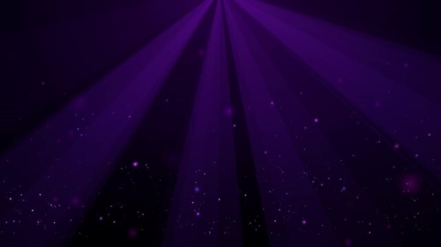 Bright purple spotlight with glowing particles in dark