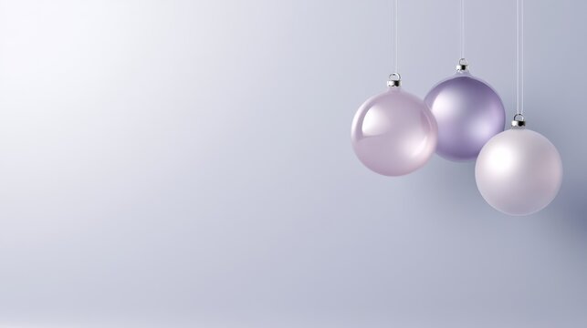 Lavender and silver Christmas baubles float against a soft lilac background, creating dreamy holiday copy space, delicate winter decor, festive elegance, Christmas, New Year.