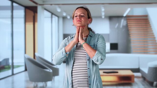 Woman Gently Touching Swollen Throat