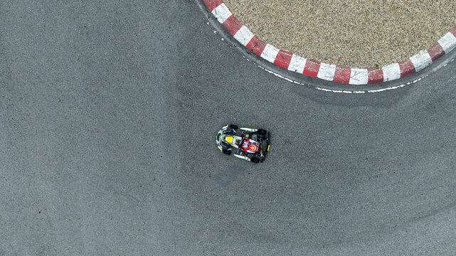 Aerial view go kart racer race curve circuit, Go kart at circuit curve, Top view race go kart track curve.