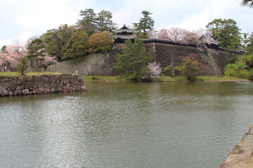 moats and surrounding wall of a castle in matsue in japan  © frdric