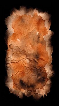 Vintage orange watercolor parchment stain isolated on black background