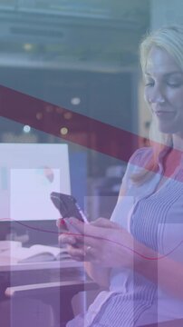 Animation of data processing over caucasian businesswoman working in office