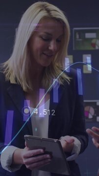 Animation of financial data processing over diverse business people working in office