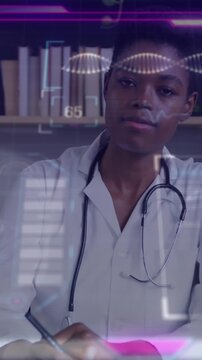 Animation of data processing over african american female doctor
