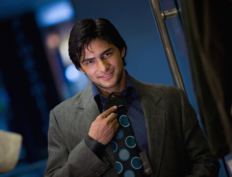 Man trying a necktie 