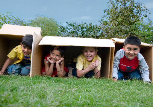Children inside boxes 