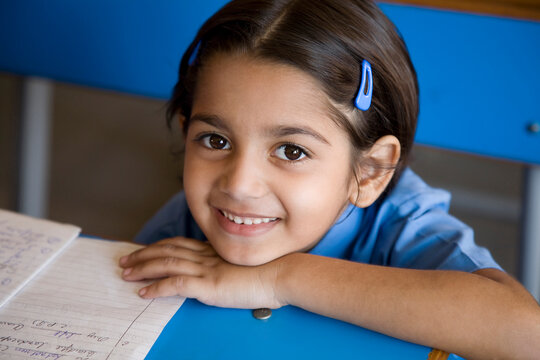 School girl at her desk 
