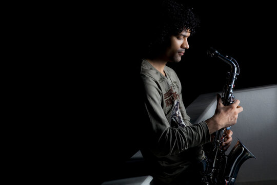 Man holding a saxophone 