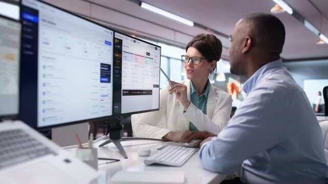 Accountant And Analyst Reviewing Year-end Financial Statements