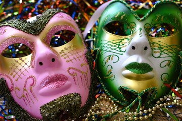 mardi gras carnival mask between confetti © Adriana