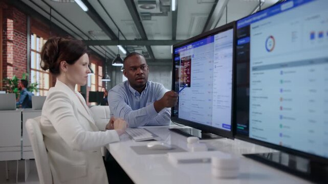 Facility Manager And Technician Discuss Maintenance Requests