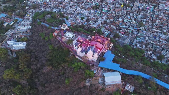 Aerial Drone View of Shri Radha Rani Temple in Barsana, Uttar Pradesh Surrounded by the Historic Barsana Village, Hills and Beautiful Temple Architecture