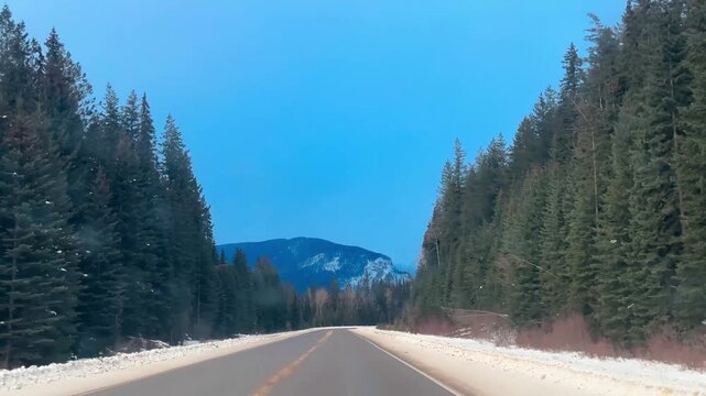 Blue sky on a winter mountain highway