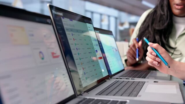 Procurement Manager And Analyst Discuss Software Solutions