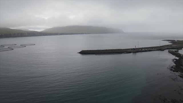 Aerial View of Salmon Farm and Harbor in Ei&eth;i, Faroe Islands