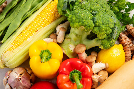 Different fresh vegetables as background.