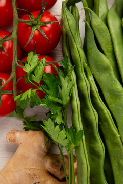 Different fresh vegetables as background.