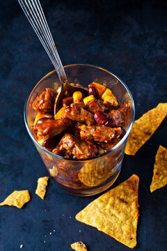 Vegetarian Chili with soy meat cut into strips in glass