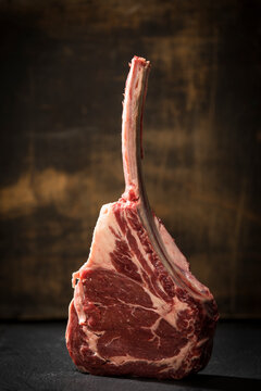 Raw tomahawk steak