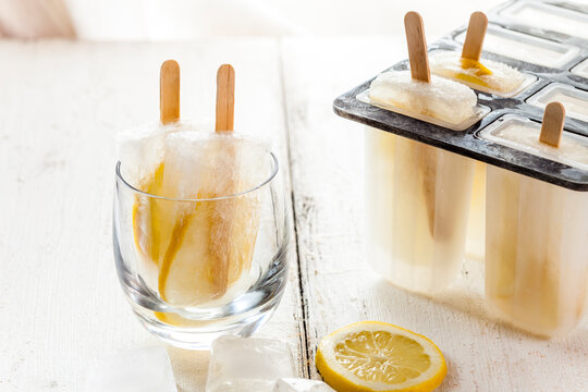 Homemade gin lemon ice lollies