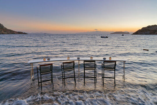 Turkey, Bodrum, Guemuesluek, Bar table on beach