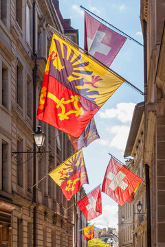 Switzerland, Geneva, Rue de Hotel de Ville, flags of city, canton and state