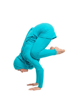 Muslim woman practicing yoga in crow pose on transparent background