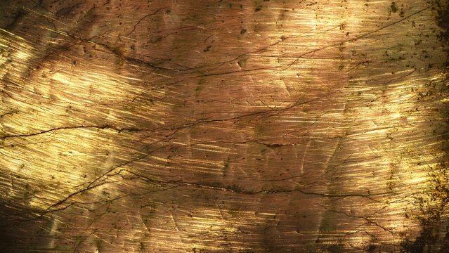 Macro Texture of Brushed Bronze and Brass Alloy with Warm Golden Highlights Over Fine Brush Grain and Subtle Dark Oxidation Veining
