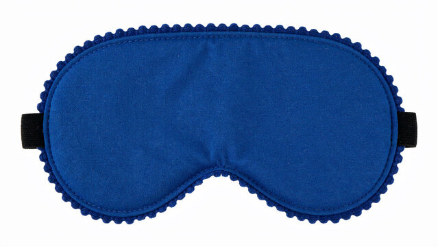 A top-down studio photograph of a bright blue sleep mask with a scalloped edge and black elastic strap on a white background