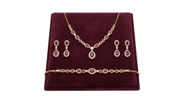 Elegant ruby jewelry set with gold necklace, matching earrings and bracelet. Luxury gemstone bridal jewelry on velvet display. isolated PNG with Transparent Background