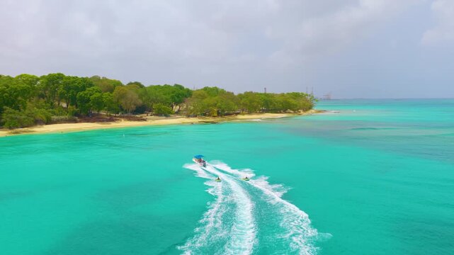 A 4k aerial clip following some tubers along the Stunning shores of Barbados