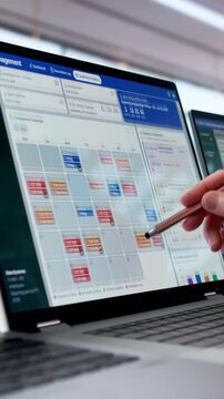 Mature Woman Uses Laptop To Audit Safety Reports