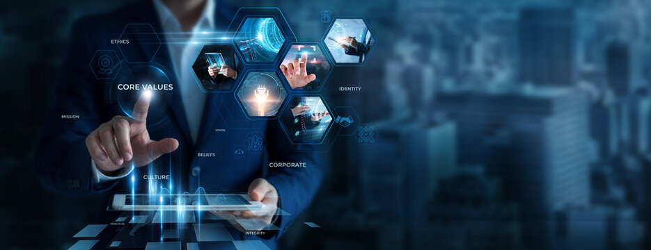 Businessman Using Tablet for Analyzing Core Values Data. Evaluating organizational principles, improving company culture, strengthening business ethics, strategic corporate development.