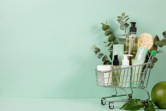 Natural cosmetics in a shopping cart with eucalyptus