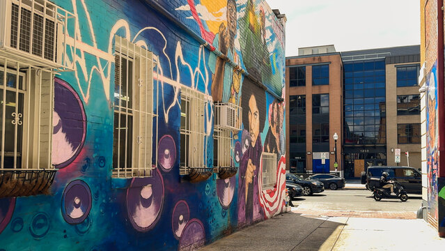 A vibrant mural on U Street NW celebrates Black cultural icons and musical heritage near Ben&rsquo;s Chili Bowl.