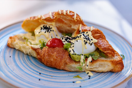 Savory filled croissant served for breakfast in Regensburg