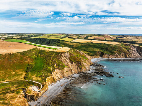 Cliffs and Fields over Welcombe Mouth Beach from a drone, North Devon and Cornwall Coastpath Border, Devon, England, Summer 2026