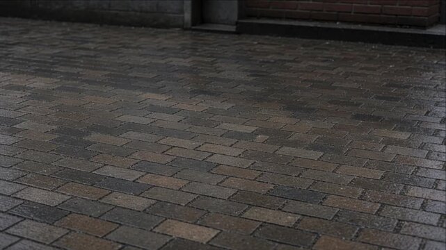 Wet Brick Pavement Cinematic City Timelapse Background with Reflective Street Walkway Texture, Moody Urban Atmosphere and Atmospheric Architectural Backdrop After Rain