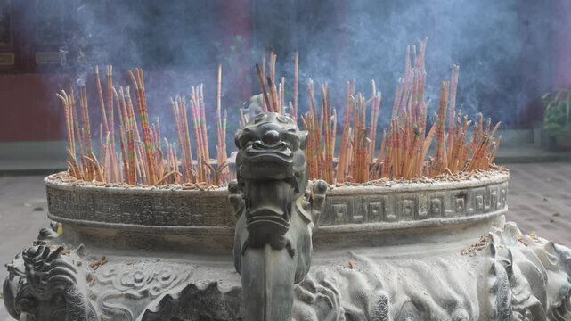 Traditional Incense Burner with Burning Sticks in Chengdu Temple