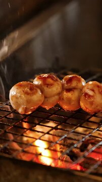 Thai Isan Pork Sausages Grilling Over Hot Charcoal Fire