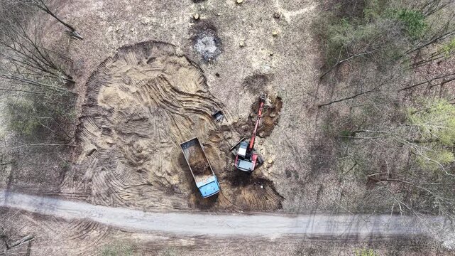 Rural excavation project with visible ground disturbance