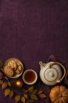 dark autumn tea and pumpkin background