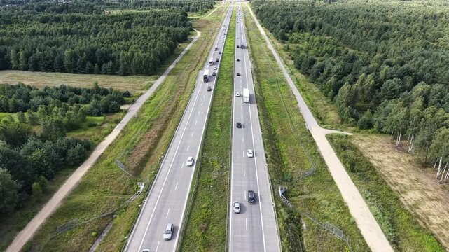 High angle view of fast traffic motion on countryside freeway