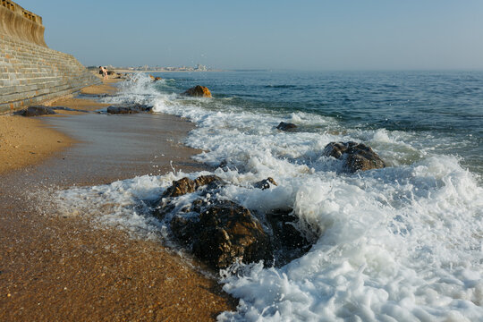 Foz do Douro Coastline in Porto, Portugal with Atlantic Waves Breaking Over Rocks