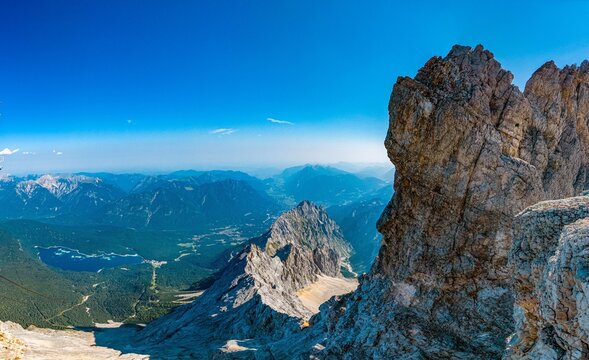Panorama from Zugspitze summit over Eibsee and the Alps