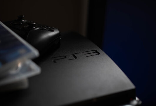 Playstation 3 Sony console used game market theme, old dusty console bokeh selective focus background image, stylish natural light
