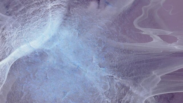 Mixing alcohol inks with epoxy resin in a creative art process