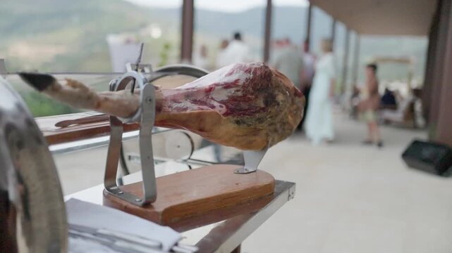 Spanish jam n serrano leg on stand at catering event